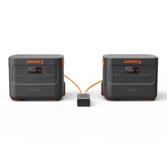 Two Jackery Explorer 2000 Plus units connected via expansion cable for doubled capacity