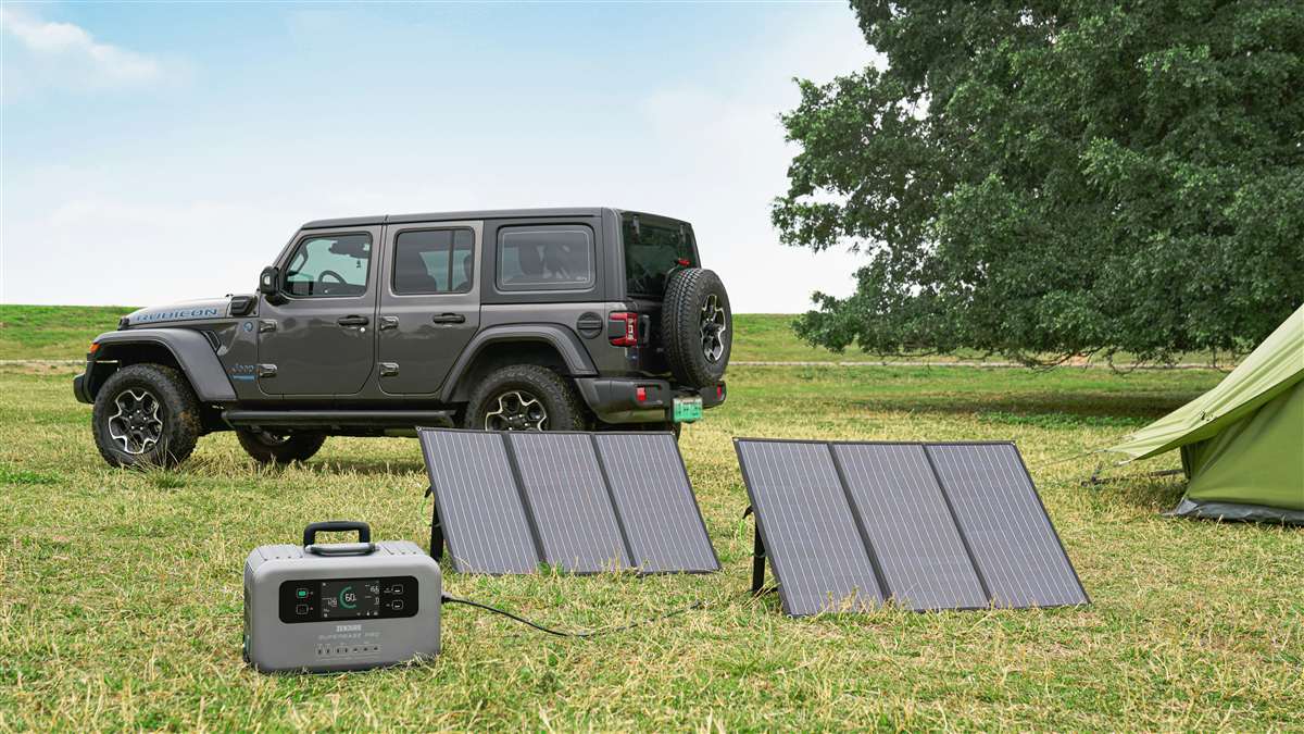 Jackery Explorer 2000 v2 powering RV appliances during off-grid boondocking campsite setup with solar panels