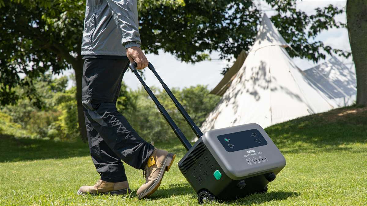 BLUETTI AC180 portable power station front angled view showing dual handles LED display and AC outlets